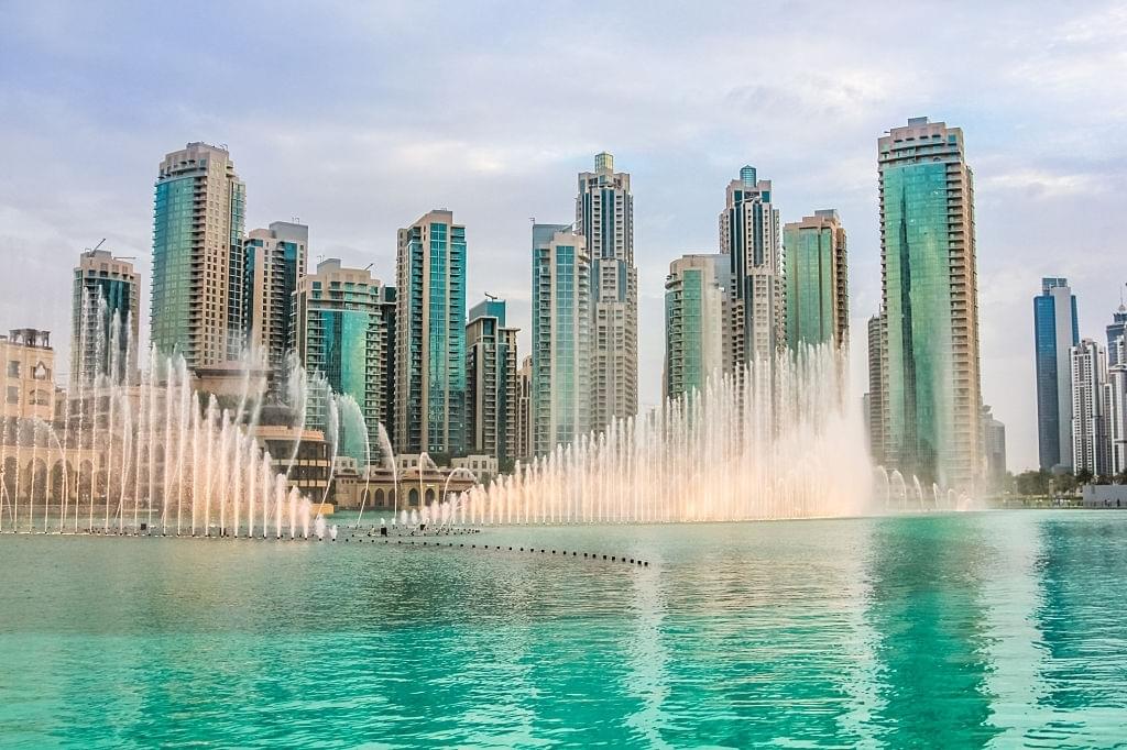 Marvel at the spectacular dancing water display of the Dubai Water Fountain